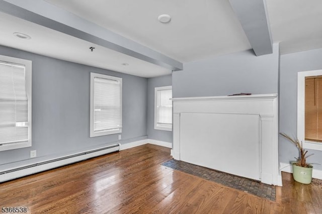 853 Westfield Ave, Rahway City, NJ 07065 - unfurnished living room featuring a baseboard heating unit and wood finished floors