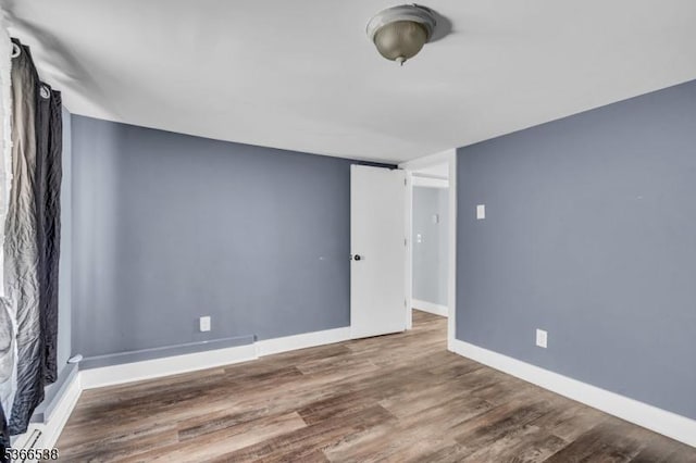 853 Westfield Ave, Rahway City, NJ 07065 - empty room featuring wood finished floors and baseboards
