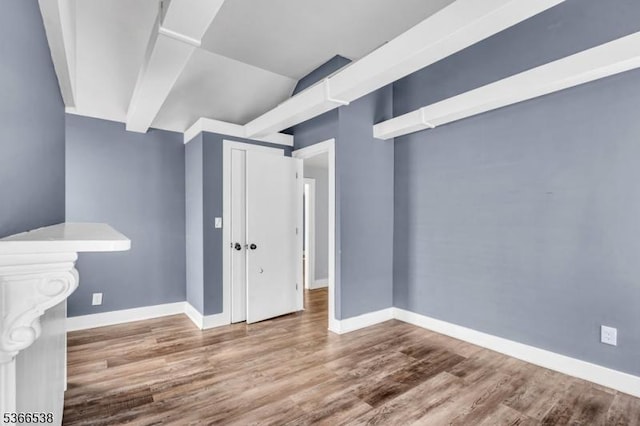 853 Westfield Ave, Rahway City, NJ 07065 - empty room with wood finished floors and vaulted ceiling