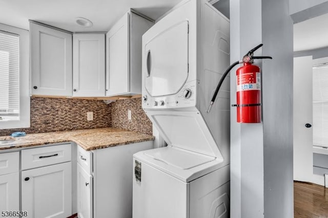 853 Westfield Ave, Rahway City, NJ 07065 - washroom featuring estacked washer and dryer and wood finished floors