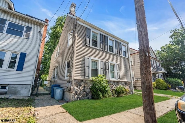 853 Westfield Ave, Rahway City, NJ 07065 - view of front of home featuring a front lawn and a gate