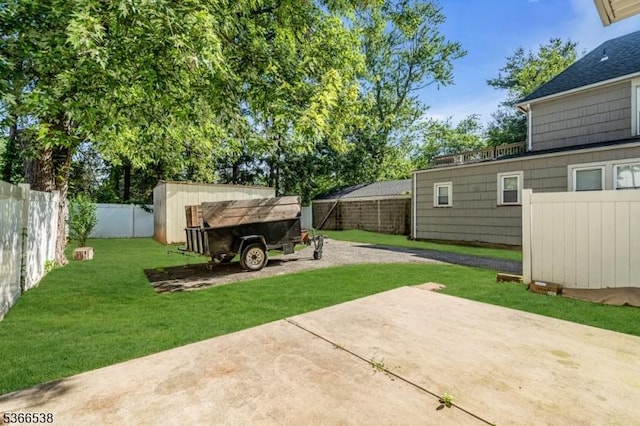 853 Westfield Ave, Rahway City, NJ 07065 - fenced backyard with a patio and a storage unit