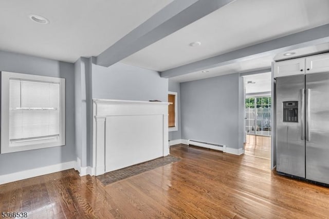 853 Westfield Ave, Rahway City, NJ 07065 - unfurnished living room featuring baseboard heating, wood finished floors, and recessed lighting