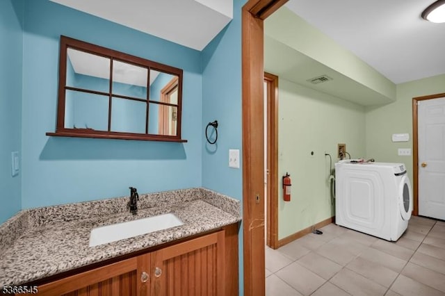 86 Underrock Rd, Sparta Twp, NJ 07871 - bathroom with washer / dryer, vanity, and tile patterned floors