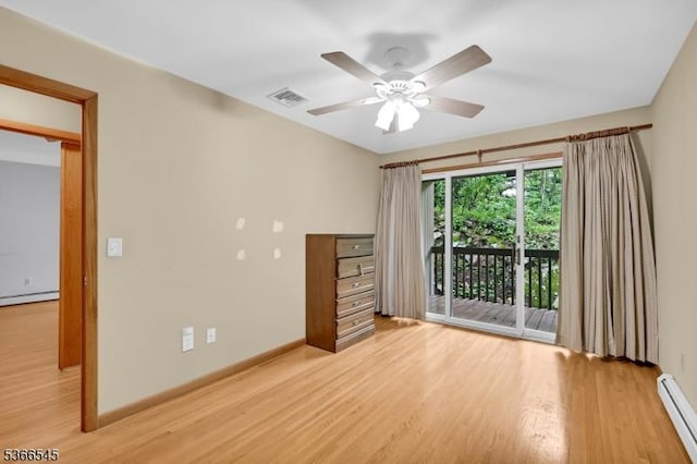 86 Underrock Rd, Sparta Twp, NJ 07871 - empty room with baseboard heating, light wood-style floors, ceiling fan, and a baseboard radiator