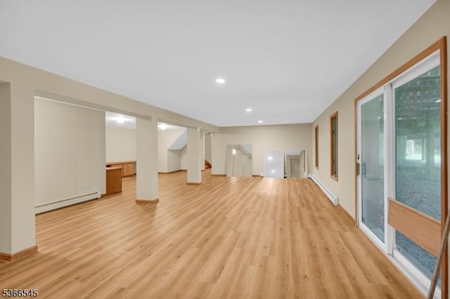 86 Underrock Rd, Sparta Twp, NJ 07871 - unfurnished living room with a baseboard radiator, light wood-style floors, stairs, and recessed lighting