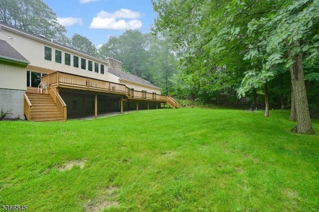 86 Underrock Rd, Sparta Twp, NJ 07871 - view of grassy yard with stairs and a deck
