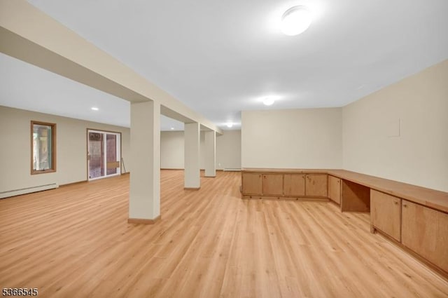 86 Underrock Rd, Sparta Twp, NJ 07871 - basement with light wood-style flooring, baseboard heating, and an office area