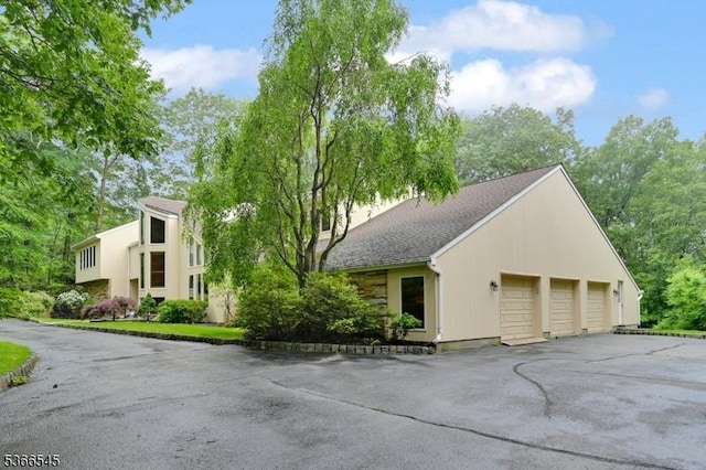 86 Underrock Rd, Sparta Twp, NJ 07871 - view of front of home featuring asphalt driveway and a garage