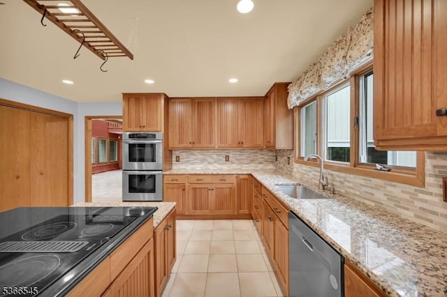 86 Underrock Rd, Sparta Twp, NJ 07871 - kitchen featuring stainless steel appliances, backsplash, light stone countertops, light tile patterned floors, and recessed lighting
