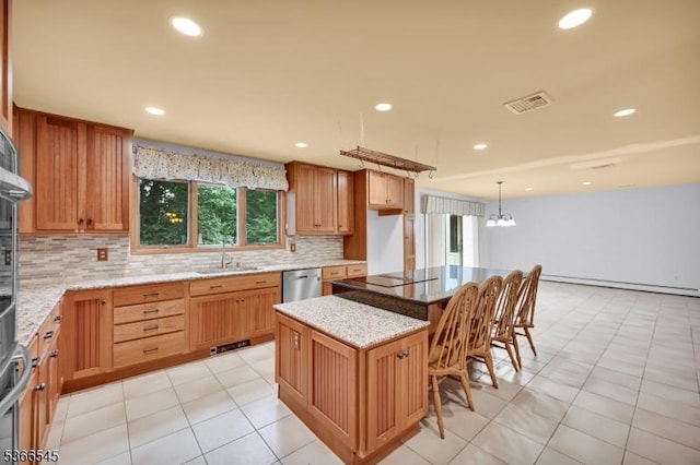86 Underrock Rd, Sparta Twp, NJ 07871 - kitchen with a baseboard radiator, dishwasher, tasteful backsplash, light stone counters, and recessed lighting