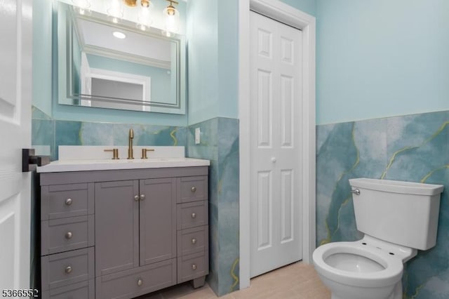 604 Skyline Dr Unit 604, Haledon Boro, NJ 07508 - half bathroom with tile walls, vanity, and wainscoting