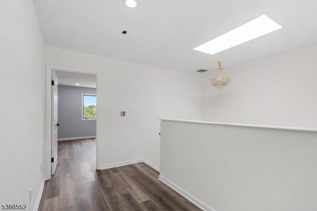 604 Skyline Dr Unit 604, Haledon Boro, NJ 07508 - empty room featuring a skylight, dark wood-style flooring, and recessed lighting