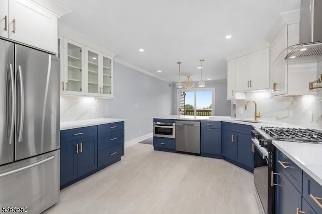 604 Skyline Dr Unit 604, Haledon Boro, NJ 07508 - kitchen featuring stainless steel appliances, wall chimney exhaust hood, blue cabinetry, white cabinets, and glass insert cabinets