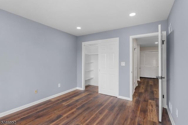 604 Skyline Dr Unit 604, Haledon Boro, NJ 07508 - unfurnished bedroom featuring dark wood-style flooring, recessed lighting, and a closet