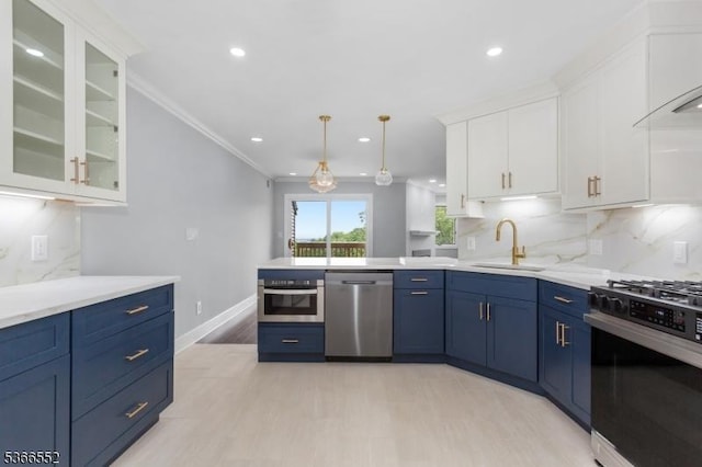 604 Skyline Dr Unit 604, Haledon Boro, NJ 07508 - kitchen featuring stainless steel appliances, blue cabinets, white cabinets, glass insert cabinets, and crown molding