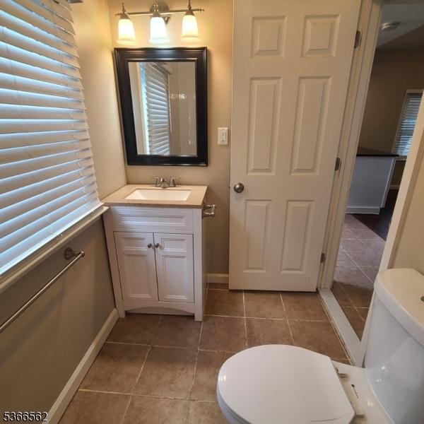 16 Ransome Pl, Plainfield City, NJ 07063 - bathroom featuring vanity and tile patterned floors