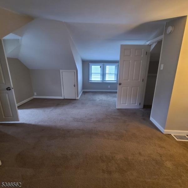 16 Ransome Pl, Plainfield City, NJ 07063 - additional living space with carpet and lofted ceiling