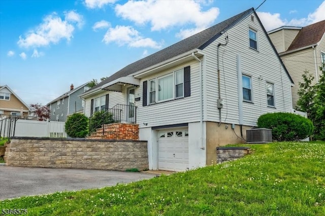 93 Meacham Ave, Nutley Twp, NJ 07110 - view of front of property with an attached garage