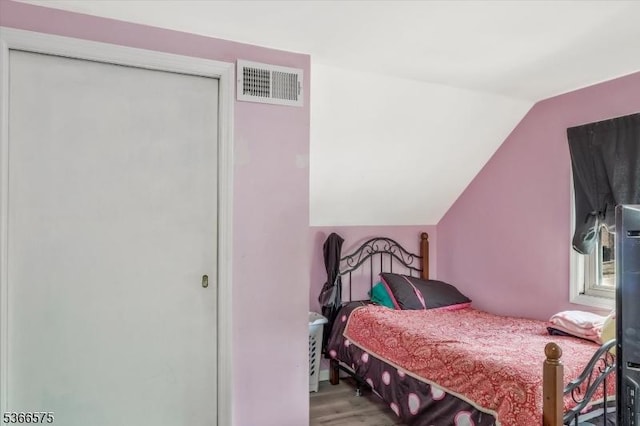 93 Meacham Ave, Nutley Twp, NJ 07110 - bedroom with vaulted ceiling and wood finished floors