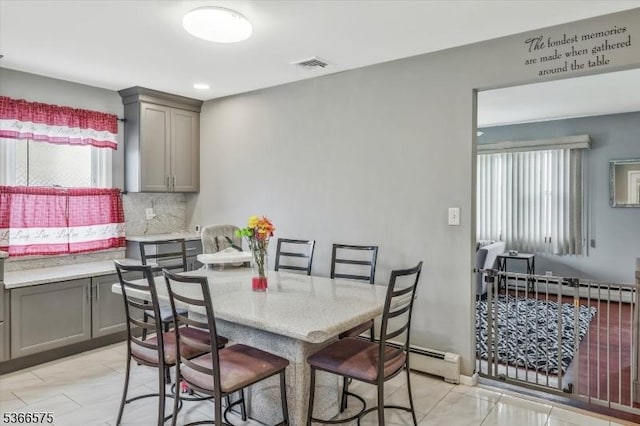 93 Meacham Ave, Nutley Twp, NJ 07110 - dining room featuring a baseboard radiator and recessed lighting
