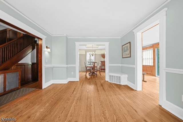 169 Knoll Rd, Parsippany-Troy Hills Twp, NJ 07005 - corridor with wood finished floors, plenty of natural light, ornamental molding, and a chandelier