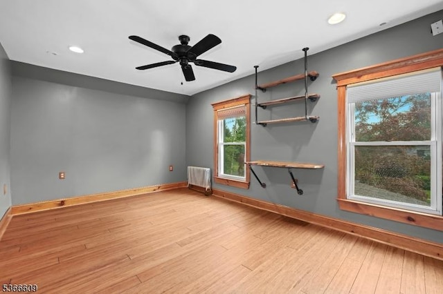 169 Knoll Rd, Parsippany-Troy Hills Twp, NJ 07005 - empty room featuring wood finished floors, ceiling fan, radiator, and recessed lighting