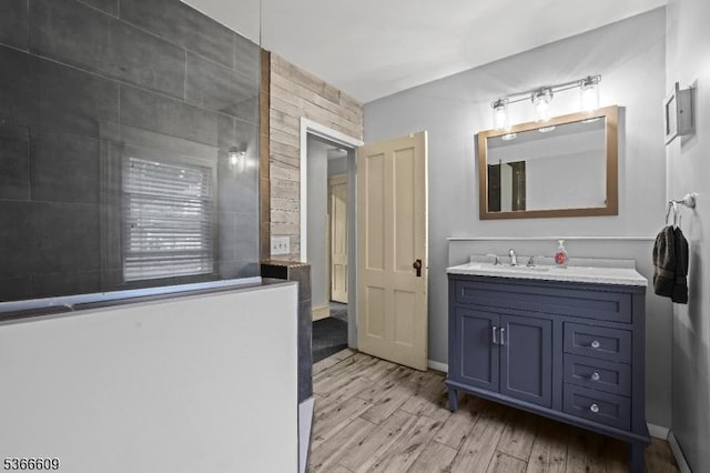 169 Knoll Rd, Parsippany-Troy Hills Twp, NJ 07005 - bathroom featuring wood finished floors and vanity