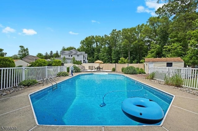 169 Knoll Rd, Parsippany-Troy Hills Twp, NJ 07005 - view of pool with a fenced backyard, a patio area, and a shed
