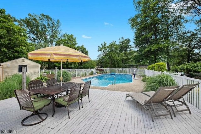 169 Knoll Rd, Parsippany-Troy Hills Twp, NJ 07005 - view of swimming pool with a wooden deck, a storage unit, and outdoor dining space