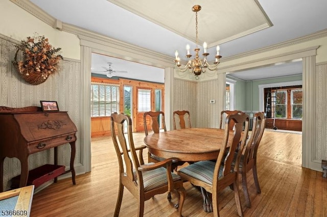 169 Knoll Rd, Parsippany-Troy Hills Twp, NJ 07005 - dining space featuring light wood-type flooring, a chandelier, wallpapered walls, crown molding, and french doors