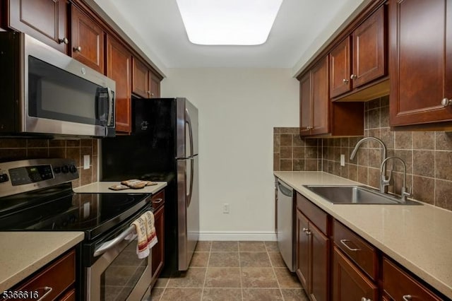7 Prospect St Unit 510, Morristown Town, NJ 07960 - kitchen featuring appliances with stainless steel finishes, decorative backsplash, and light countertops