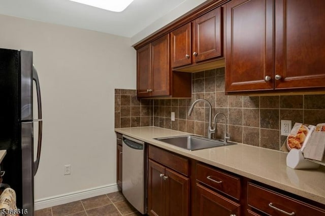 7 Prospect St Unit 510, Morristown Town, NJ 07960 - kitchen with freestanding refrigerator, dishwasher, light countertops, backsplash, and dark tile patterned flooring