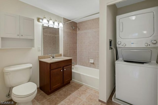 7 Prospect St Unit 510, Morristown Town, NJ 07960 - bathroom with estacked washer and dryer, vanity, bathing tub / shower combination, and tile patterned floors