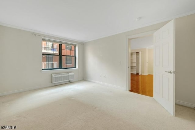 7 Prospect St Unit 510, Morristown Town, NJ 07960 - unfurnished room with ornamental molding, a wall mounted AC, and carpet