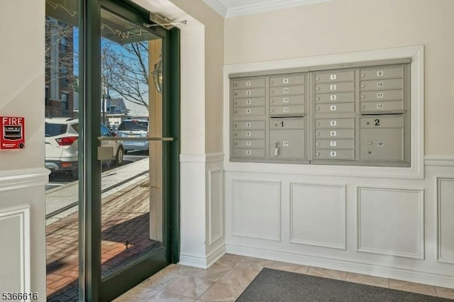 7 Prospect St Unit 510, Morristown Town, NJ 07960 - view of property's community featuring mail area, crown molding, a decorative wall, and a wainscoted wall
