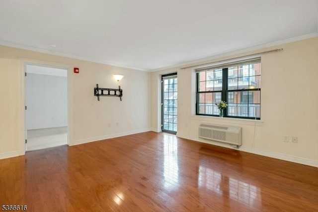 7 Prospect St Unit 510, Morristown Town, NJ 07960 - spare room with crown molding, wood finished floors, and a wall mounted AC