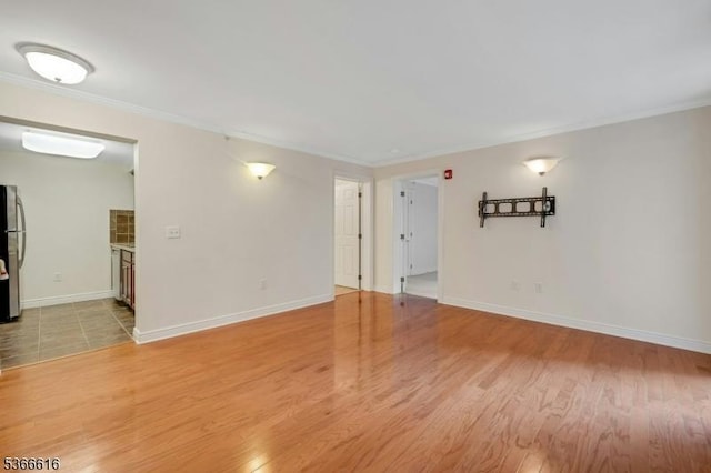 7 Prospect St Unit 510, Morristown Town, NJ 07960 - spare room with crown molding and light wood-type flooring