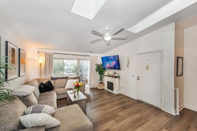 204 Robertson Way Unit 204, Lincoln Park Boro, NJ 07035 - living area with a skylight, vaulted ceiling, dark wood finished floors, a fireplace, and a ceiling fan