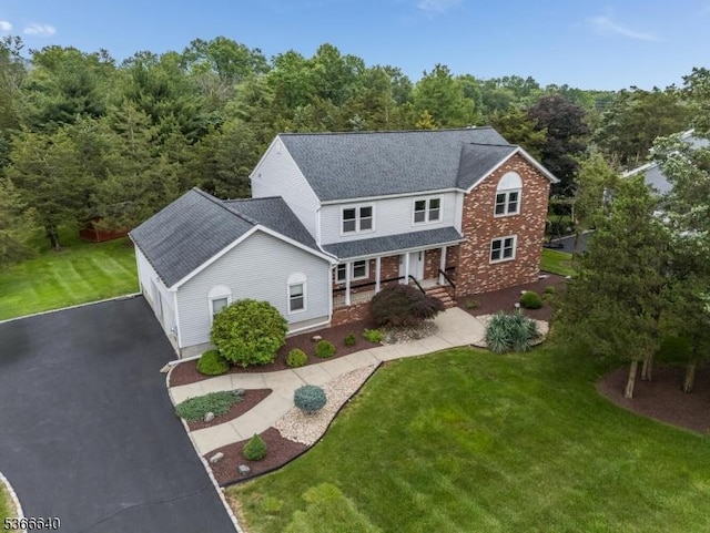 836 Dow Rd, Bridgewater Twp, NJ 08807 - traditional-style home with a porch, driveway, a front lawn, and a shingled roof