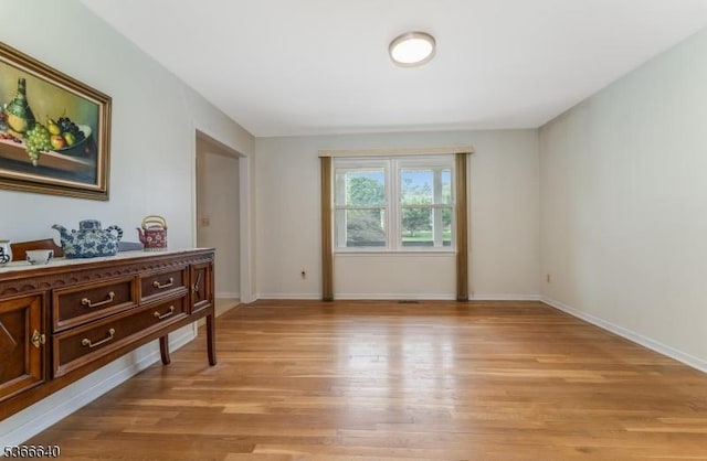 836 Dow Rd, Bridgewater Twp, NJ 08807 - empty room with light wood-style floors and baseboards