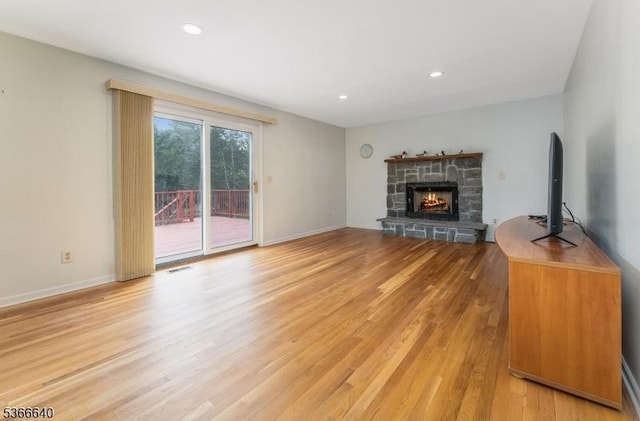 836 Dow Rd, Bridgewater Twp, NJ 08807 - unfurnished living room with light wood finished floors, a fireplace, and recessed lighting