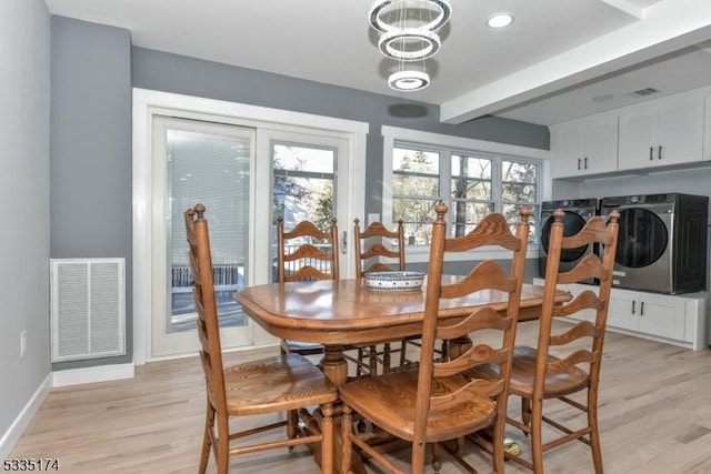 584 Lake Shore Dr, West Milford Twp, NJ 07421 - dining room with washer and dryer, light wood-style flooring, and beamed ceiling