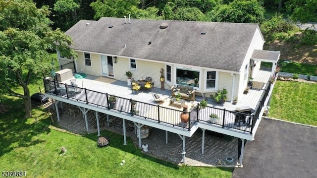 306 W Valley Brook Rd, Washington Twp, NJ 07830 - back of house featuring a wooden deck, a yard, outdoor dining area, a shingled roof, and an outdoor hangout area