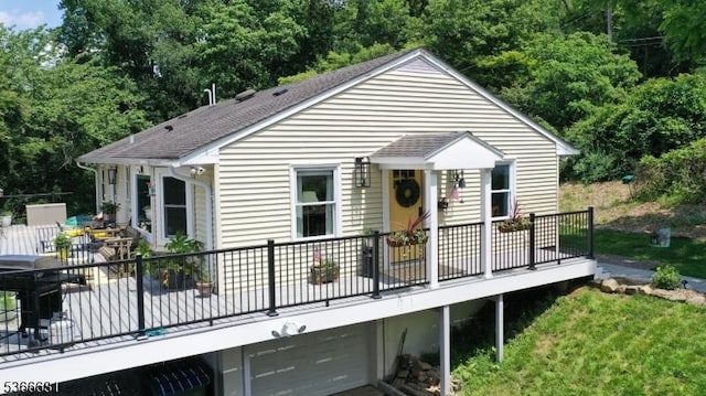 306 W Valley Brook Rd, Washington Twp, NJ 07830 - back of house with a garage, roof with shingles, and a deck