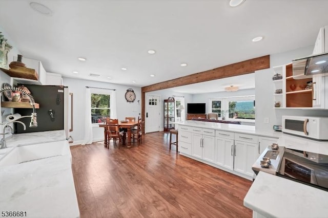 306 W Valley Brook Rd, Washington Twp, NJ 07830 - kitchen featuring white microwave, freestanding refrigerator, white cabinetry, wood finished floors, and recessed lighting