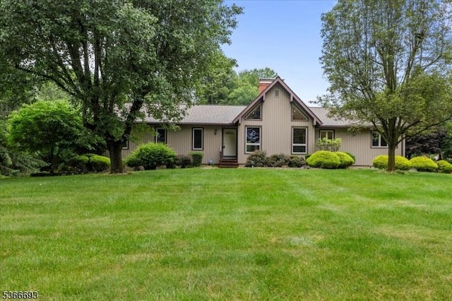 31 Casper Berger Rd, Readington Twp, NJ 08889 - view of front of home with a front lawn and a chimney