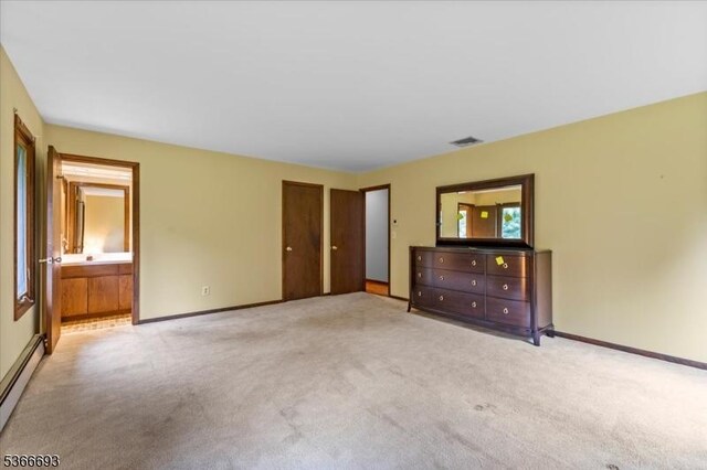 31 Casper Berger Rd, Readington Twp, NJ 08889 - unfurnished bedroom with carpet floors, a baseboard radiator, and ensuite bathroom