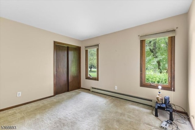 31 Casper Berger Rd, Readington Twp, NJ 08889 - unfurnished bedroom featuring a baseboard radiator, a closet, and carpet floors