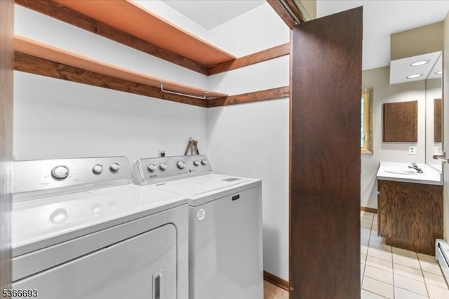 31 Casper Berger Rd, Readington Twp, NJ 08889 - laundry area with washing machine and dryer, light tile patterned flooring, and baseboard heating